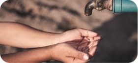 Hands holding water